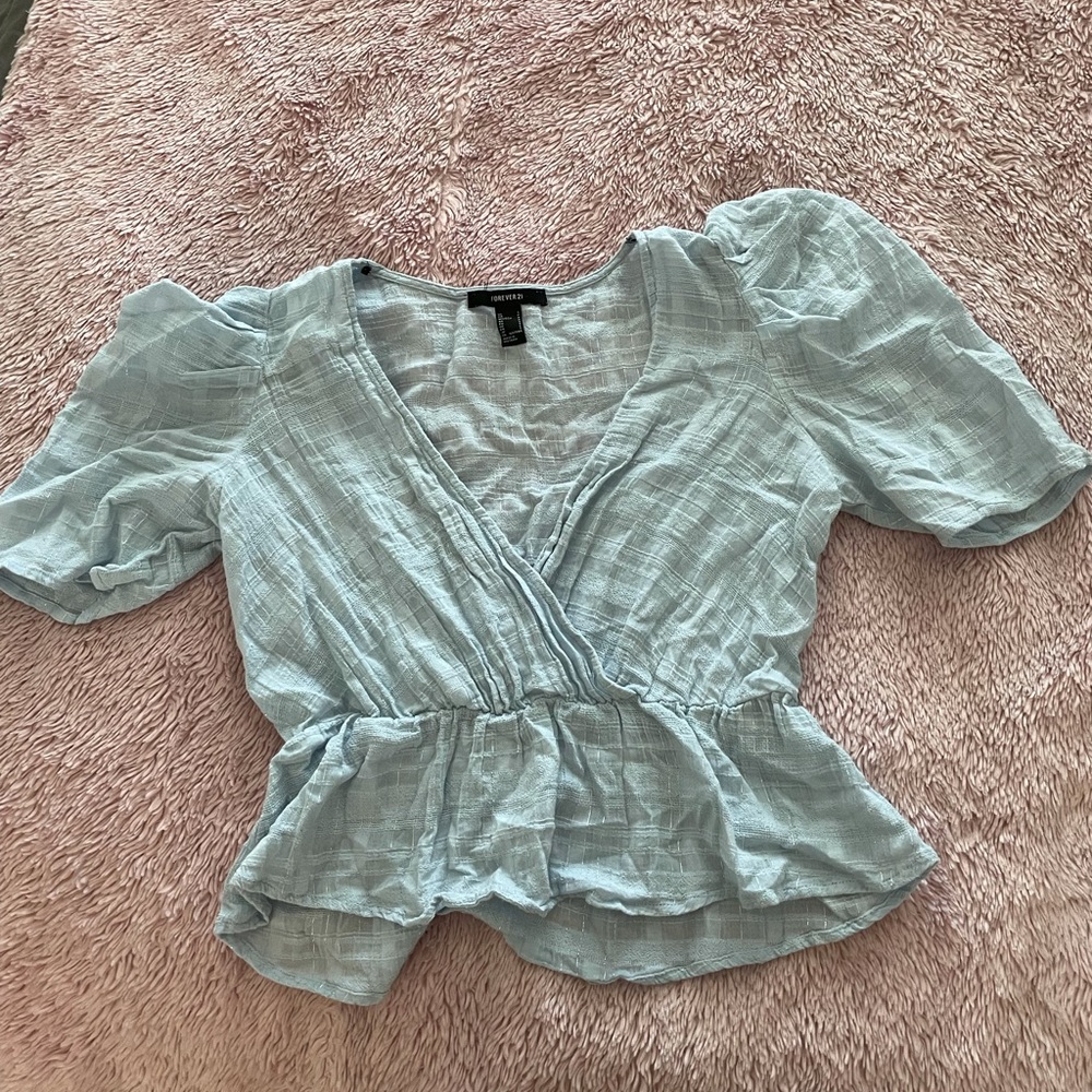Sheer, puffy sleeves, low cut
